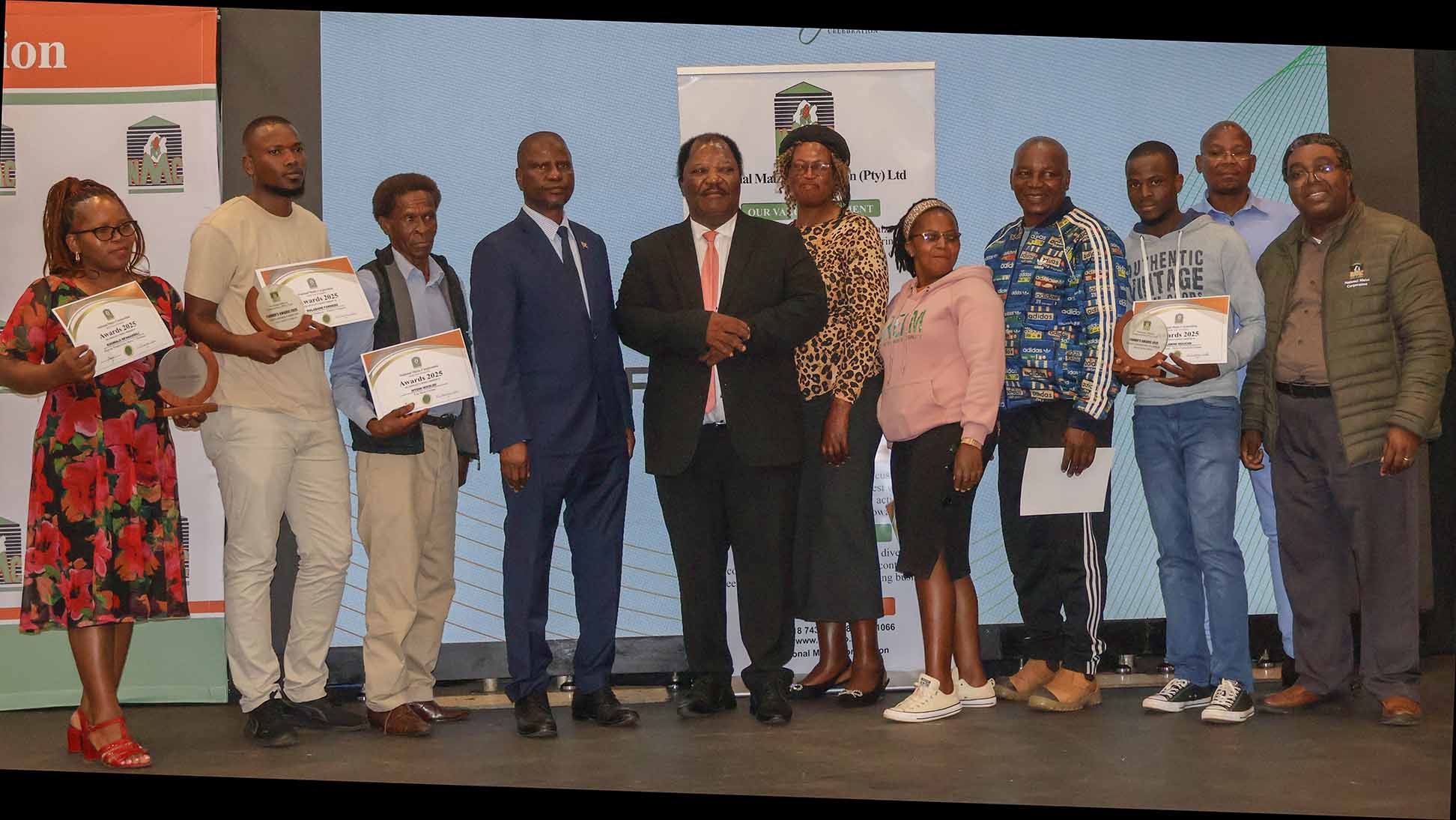 Minister for Agriculture Mandla Tshawuka (4th L) and the high table with the winners from other categories.